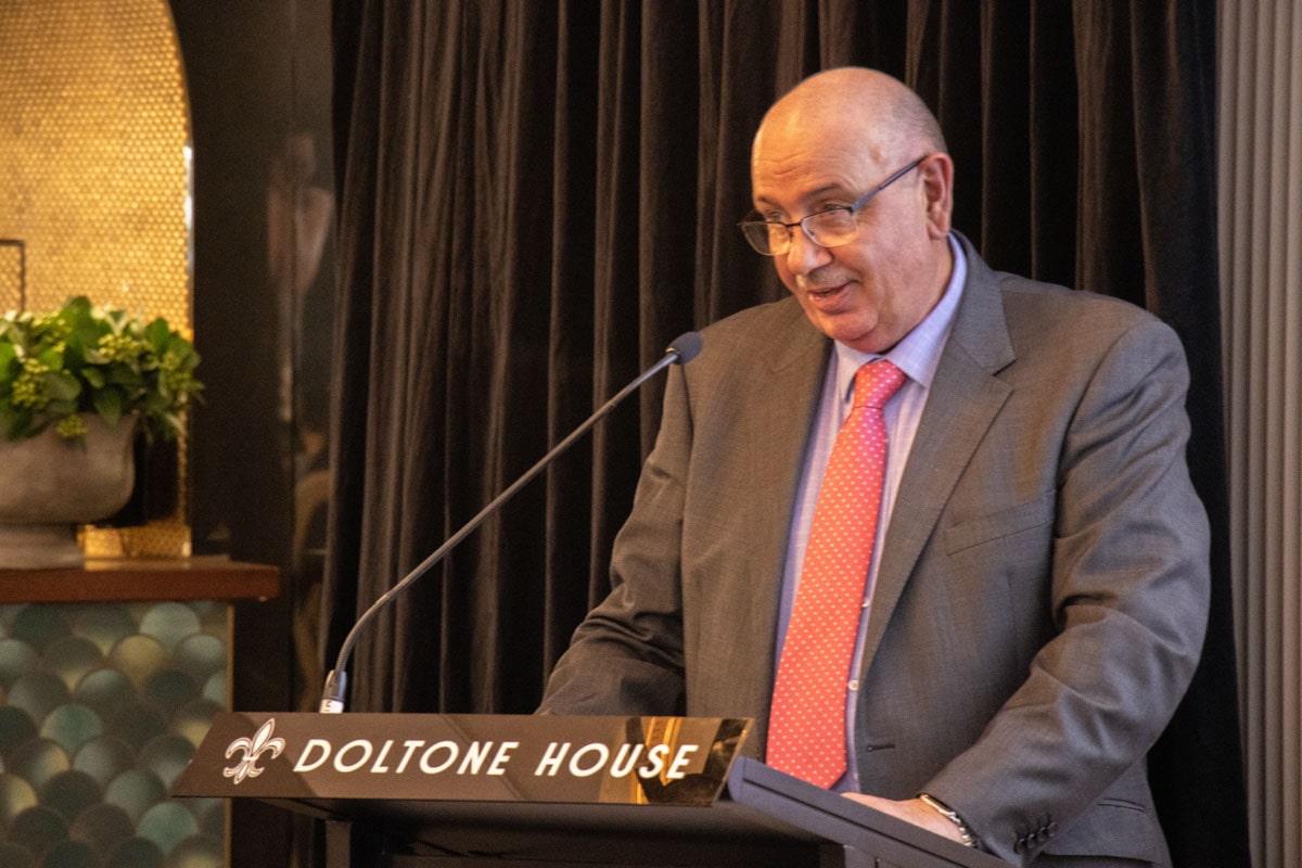 Adviser Choice Risk Awards Mike Taylor at the podium