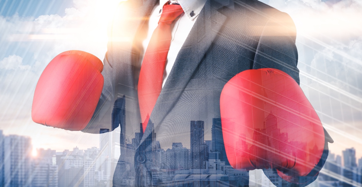 Businessman in boxing gloves