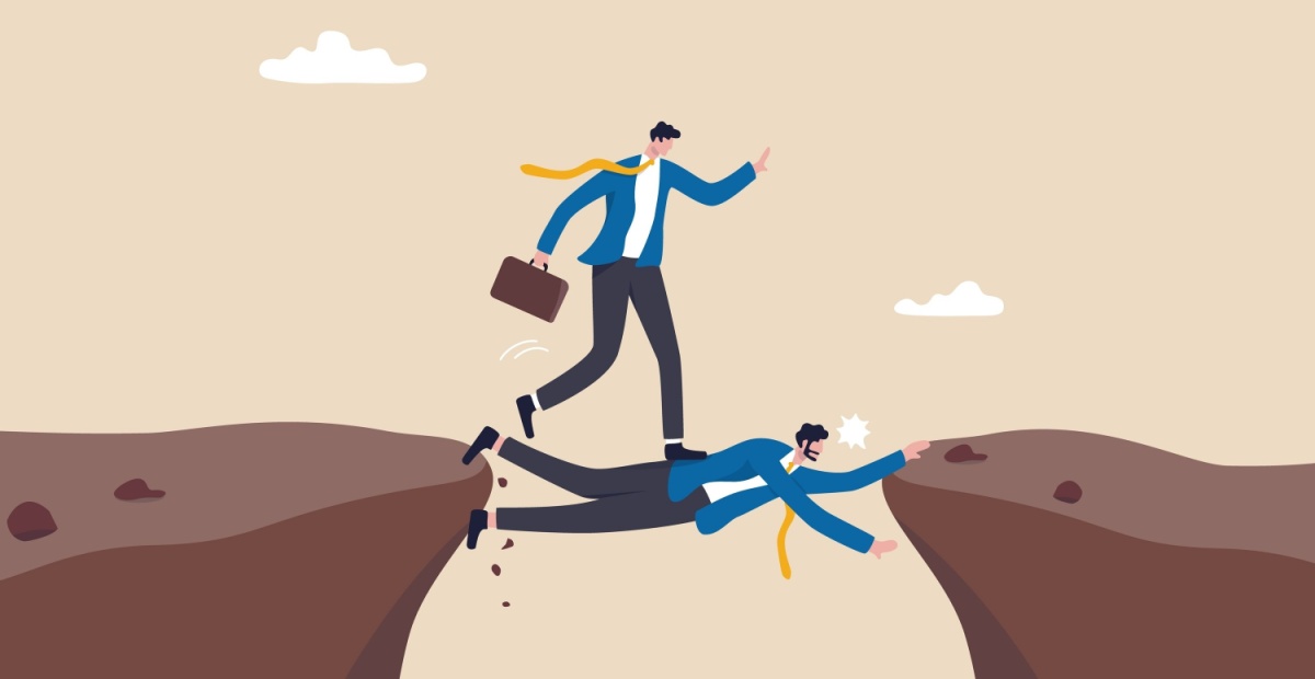 Man walks over another man