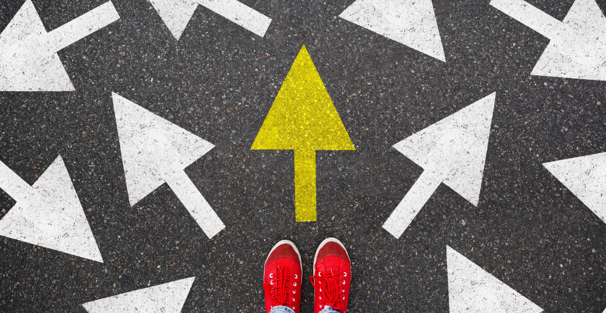 Red shoes follow yellow arrow