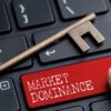Keyboard with finger pressing red Market Dominance button