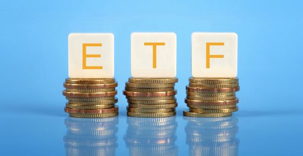 ETF letters sitting on 3 stacks of coins