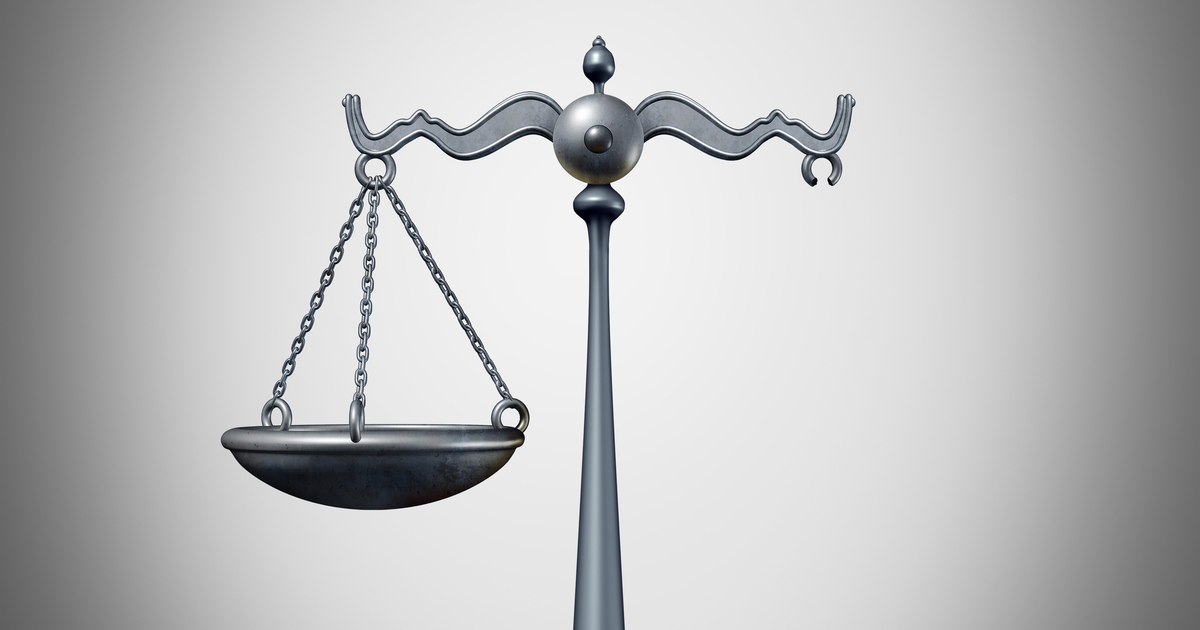Broken scale of justice